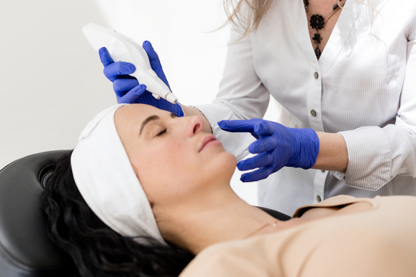 Client resting comfortably during a Plexr plasma procedure in a medical aesthetics clinic