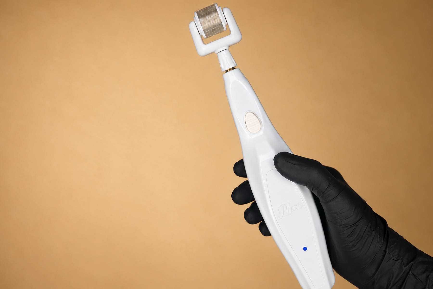 Plexr Lumen plasma energy microneedling device held in a gloved hand