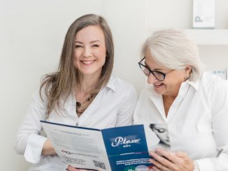 Client and practitioner sharing a lighthearted moment during a Plexr consultation in clinic